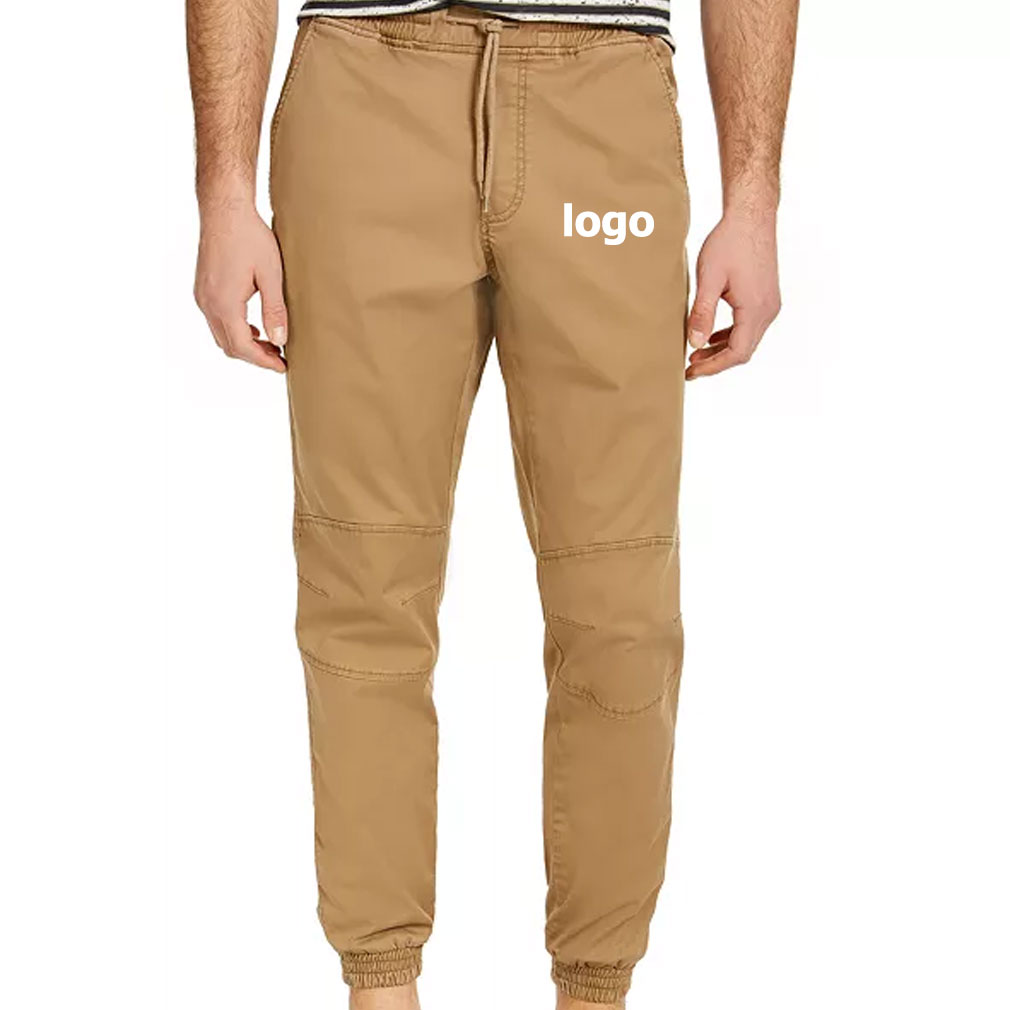 Wholesale custom logo joggers for men in khaki cotton twill with elastic cuffs.